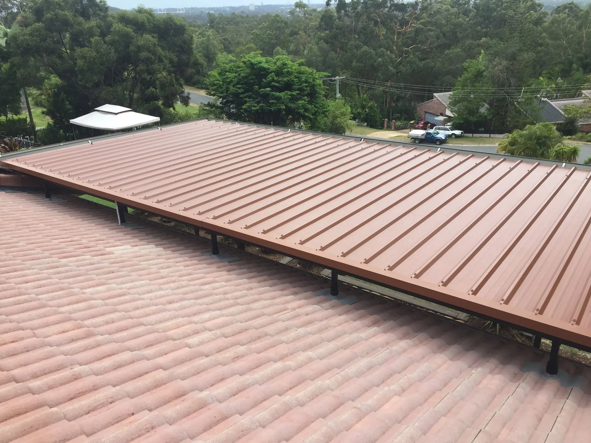 Terracotta tile and Colorbond roof finished by Ultra
