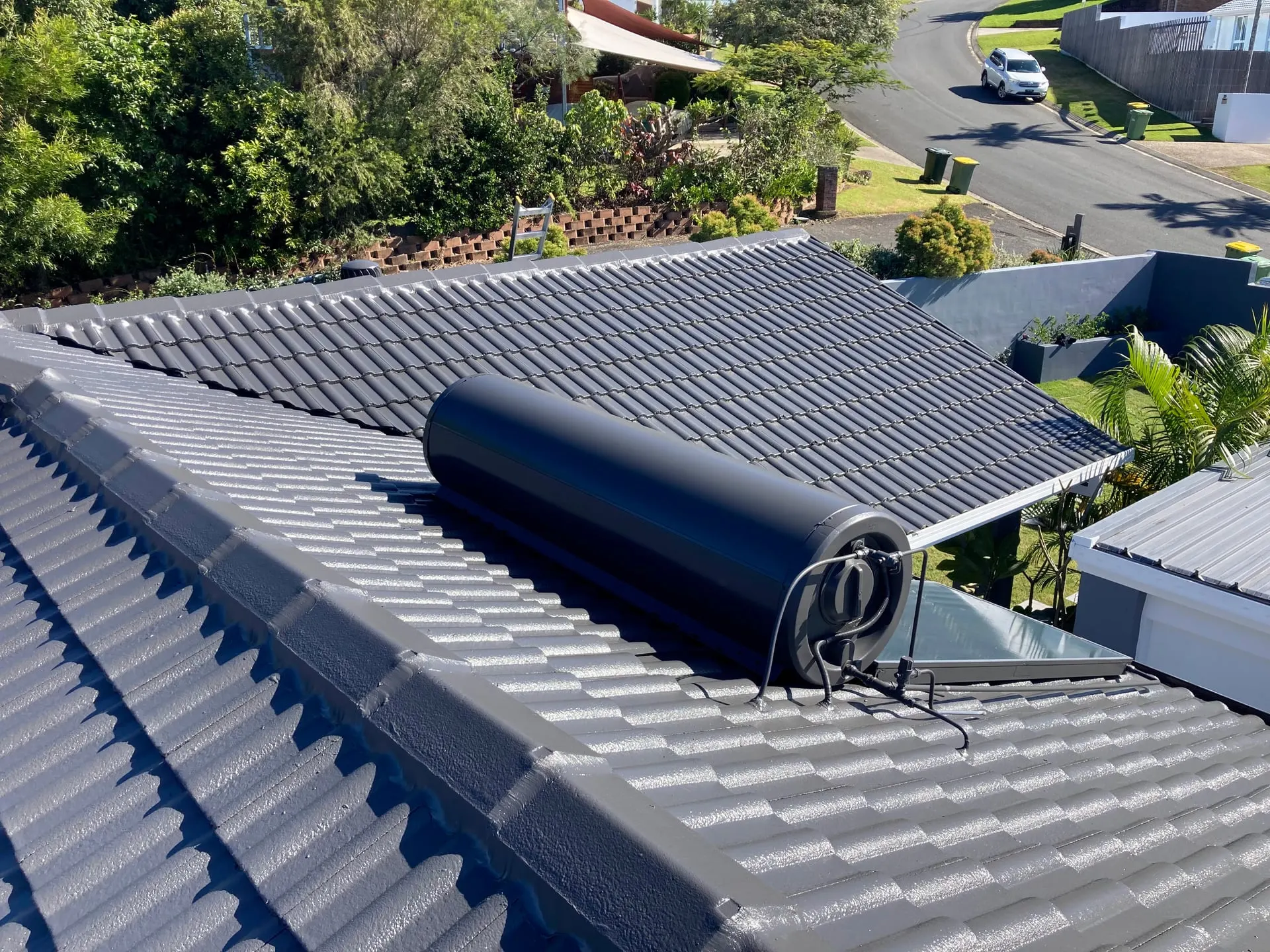 Restored charcoal tiled roof with fresh ridge pointing